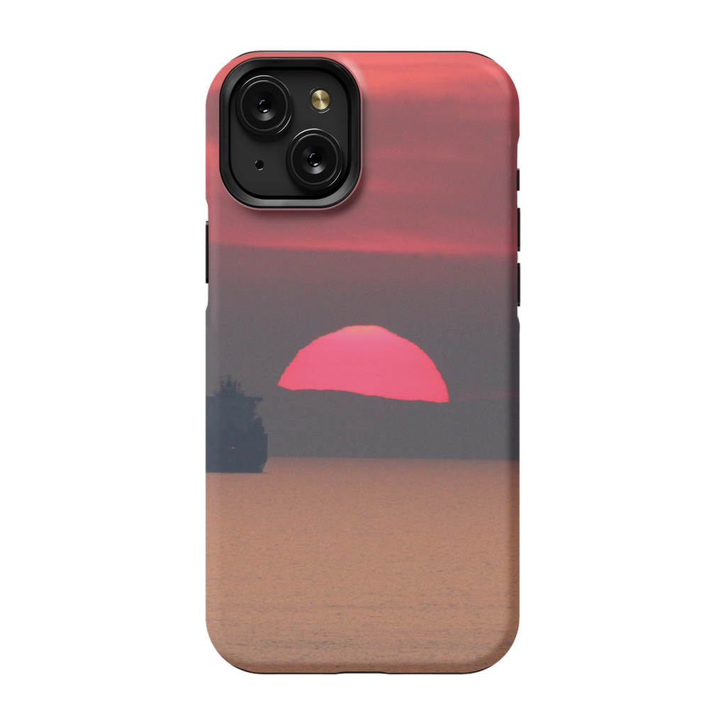Premium cell phone case featuring a Ship at Sunset over Corsica coast by Sam Gilliss Visual Arts, showcasing sunset and Mediterranean view.