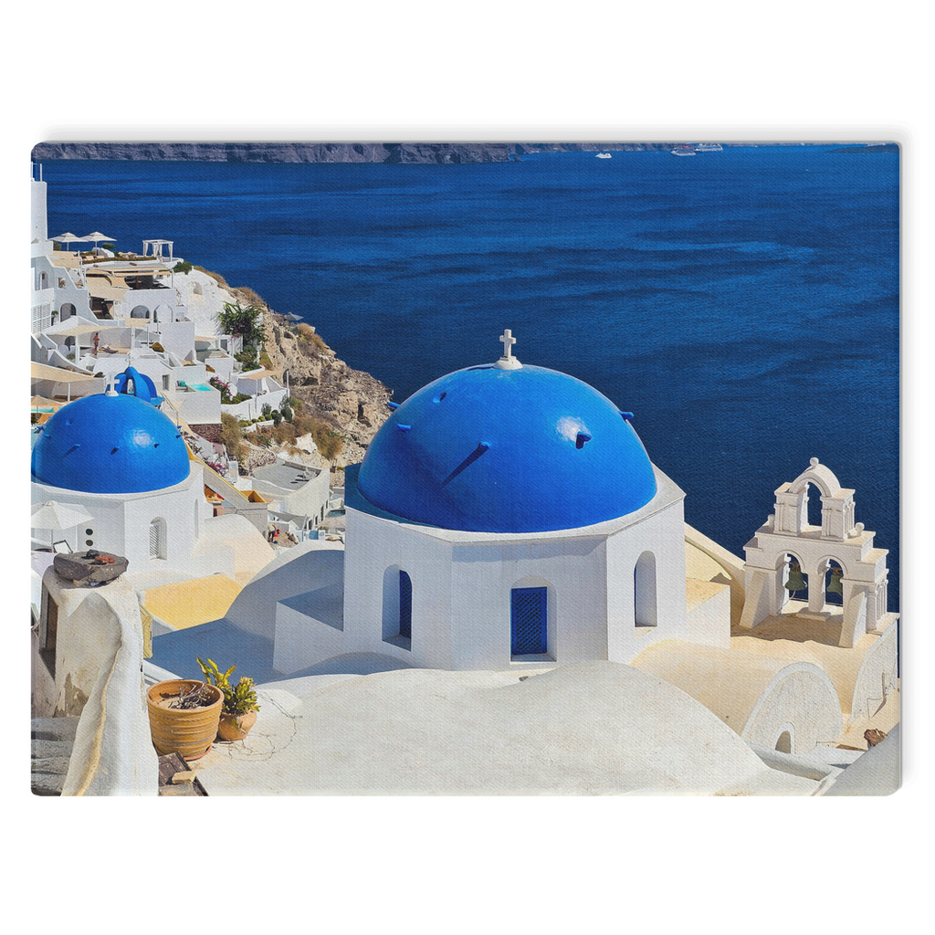 Santorini Blue Domes canvas wall art by Sam Gilliss Visual Arts showcasing Oia's iconic blue-domed churches and Mediterranean coastal scenery.