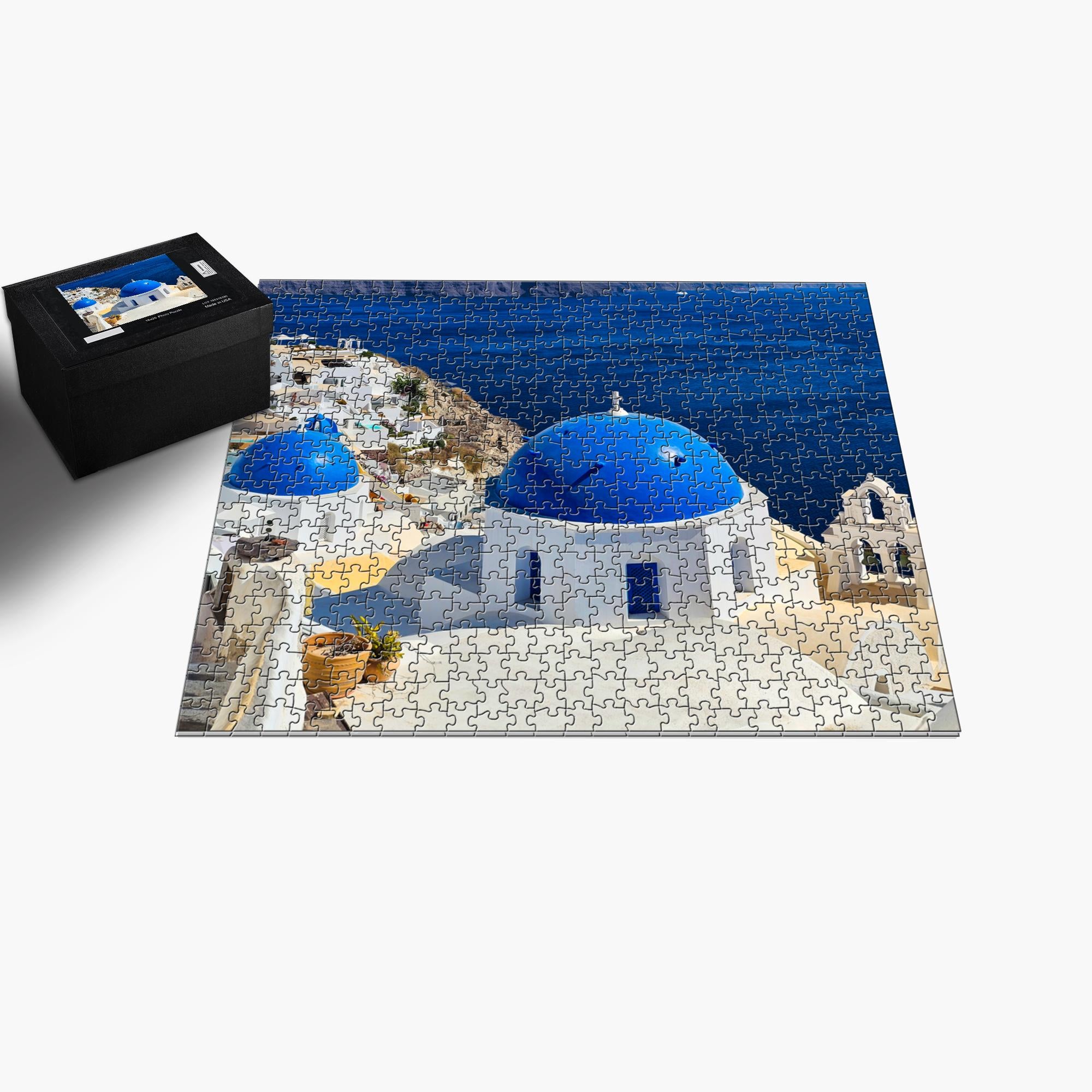 Sam Gilliss Visual Arts Santorini Blue Domes puzzle featuring Oia Greece with 110 to 1000 pieces, detailed fine art jigsaw puzzle.