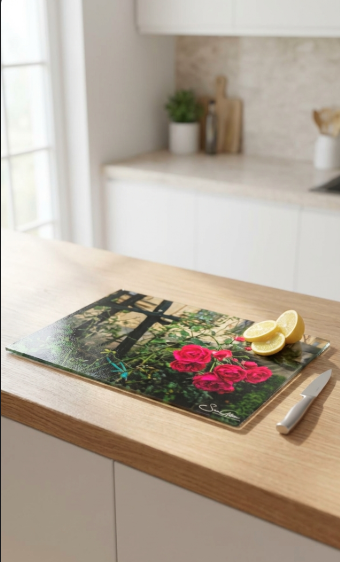 Sam Gilliss Visual Arts Rosengarten of Bamberg tempered glass cutting board and elegant placemat, showcasing intricate floral design.