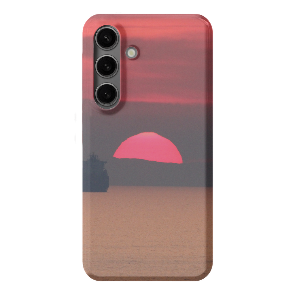 Premium cell phone case featuring a Sam Gilliss Visual Arts design of a ship at sunset on the Mediterranean coast in Corsica.