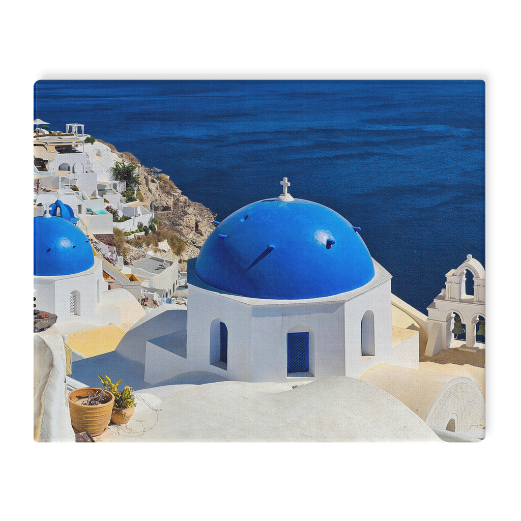 Santorini Blue Domes canvas wall art by Sam Gilliss Visual Arts showcasing iconic Oia, Greece with vibrant blue domes and Mediterranean scenery.