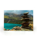 Humantay Lake in Peru printed on a tempered glass cutting board and elegant placemat by Sam Gilliss Visual Arts, showcasing vibrant mountain scenery.