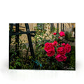 Sam Gilliss Visual Arts Rosengarten of Bamberg tempered glass cutting board and elegant placemat on a table, showcasing intricate floral design.